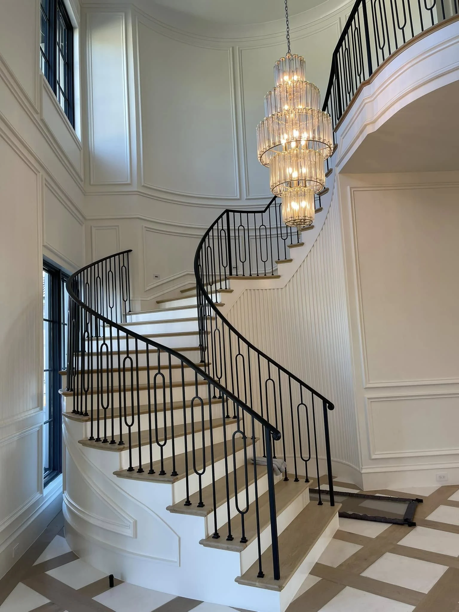 Luxury staircase and millwork painting Dallas TX by JCL Painting LLC